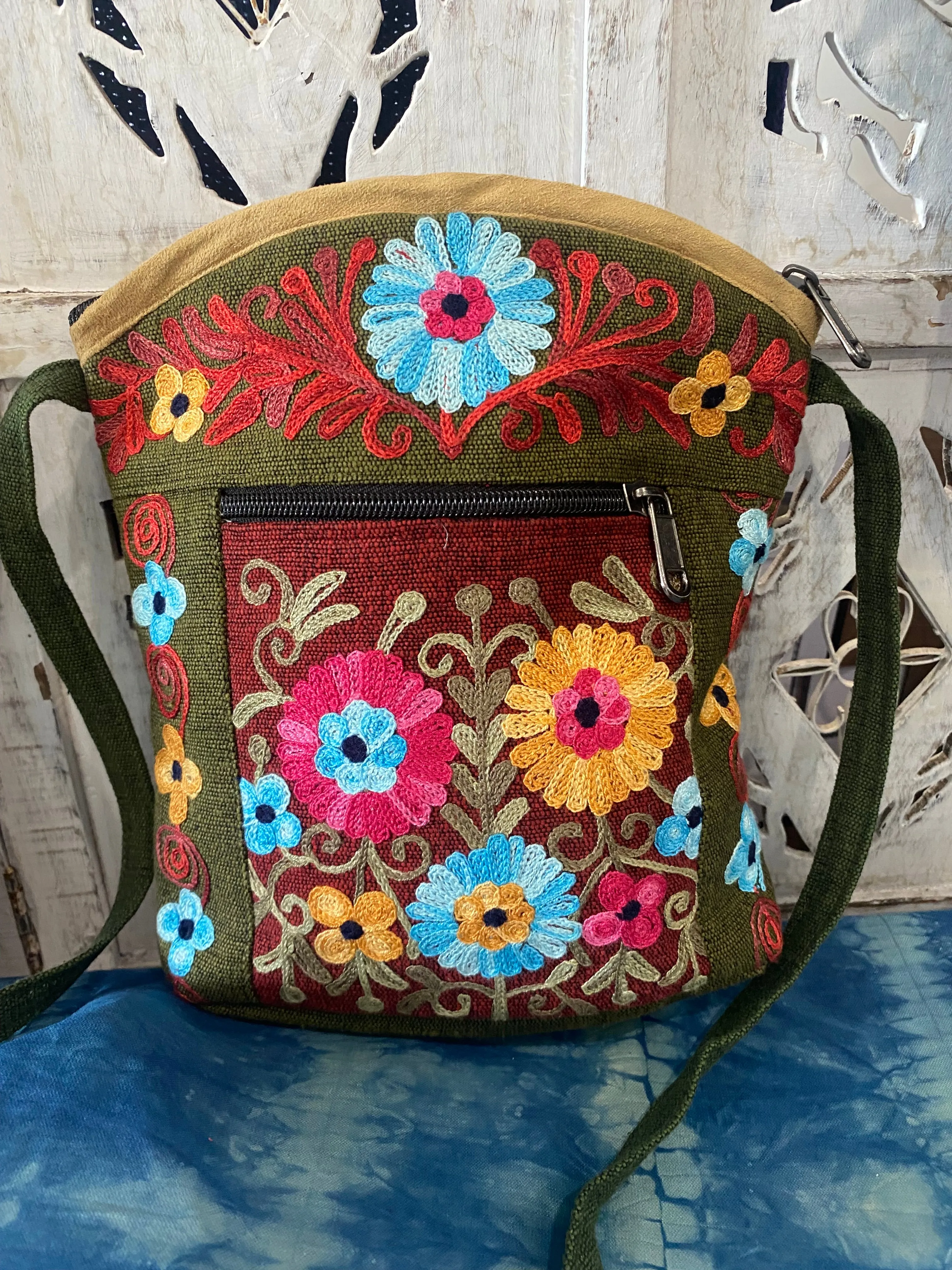 LWH Embroided Round Top Flower Handbag with shoulder strap.