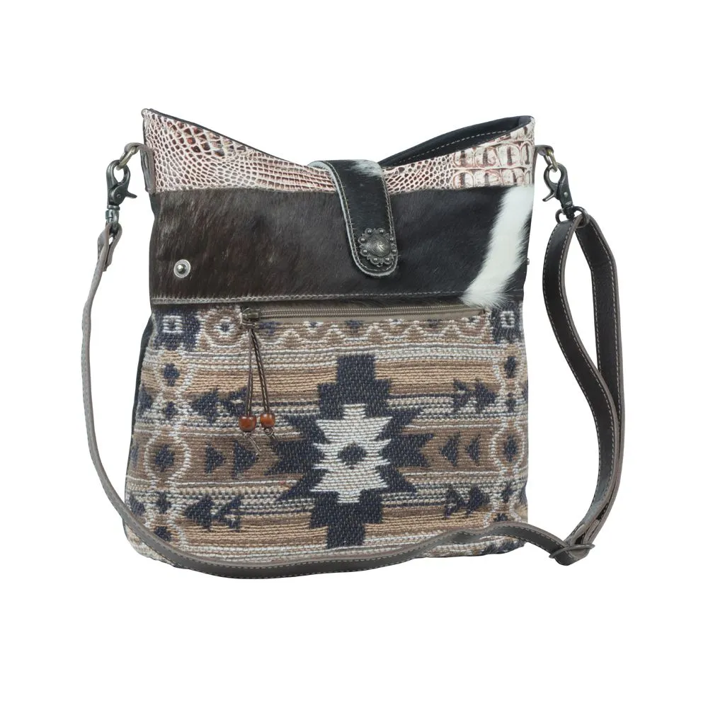 Myra Bag Panthea Shoulder Bag: Artistic Elegance with Tassels and Cowhide Flap